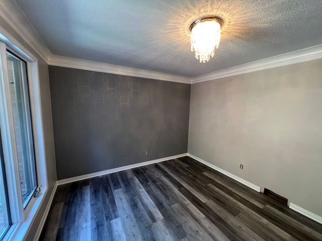Living room walls refinished to a clean neutral tone