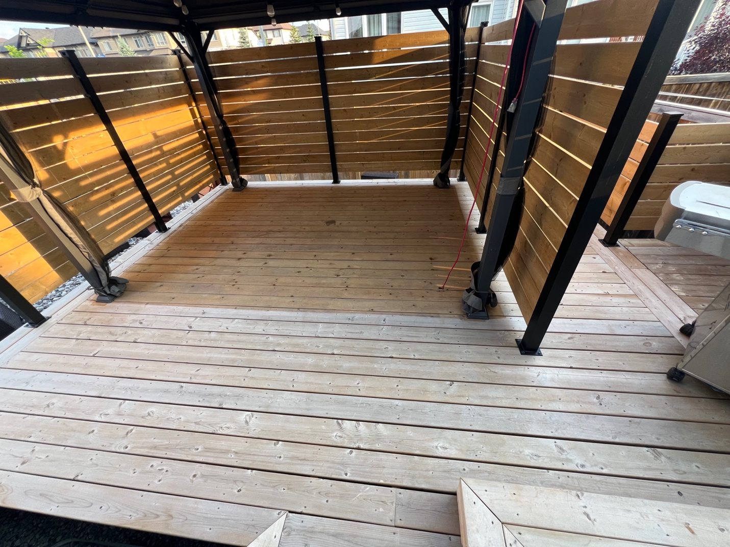Weathered deck before staining in Manotick